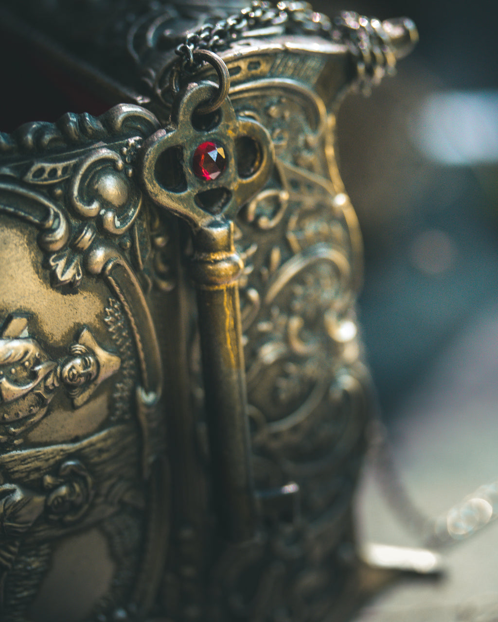 Hekate’s Crossroads Key with Almandine Garnet: A Symbol of Transformation, Passion, and the Power of Choice