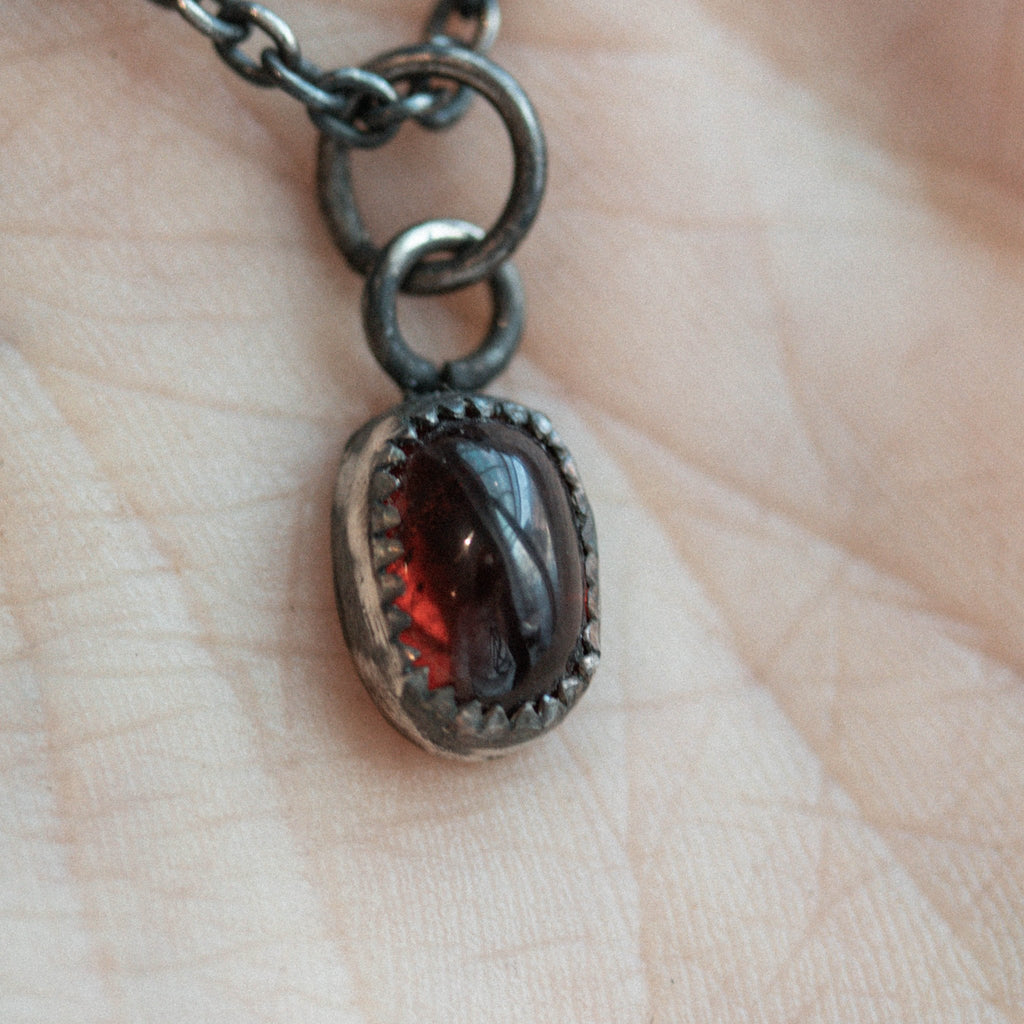 Cabochon Garnet Charm - Machinations