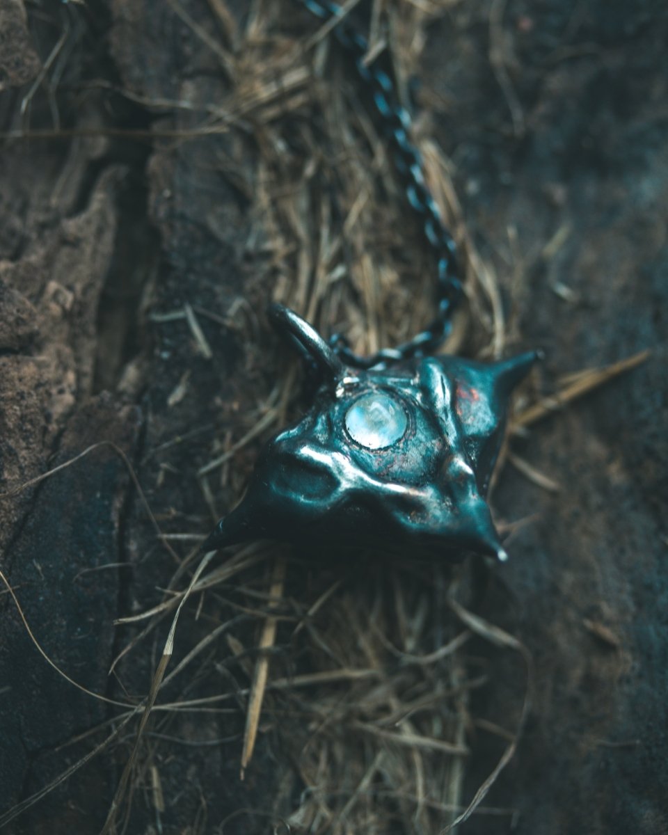 Devil Pods Charm with Moonstone: Handcrafted Silver Charm with 23.5K Gold Accents - Machinations