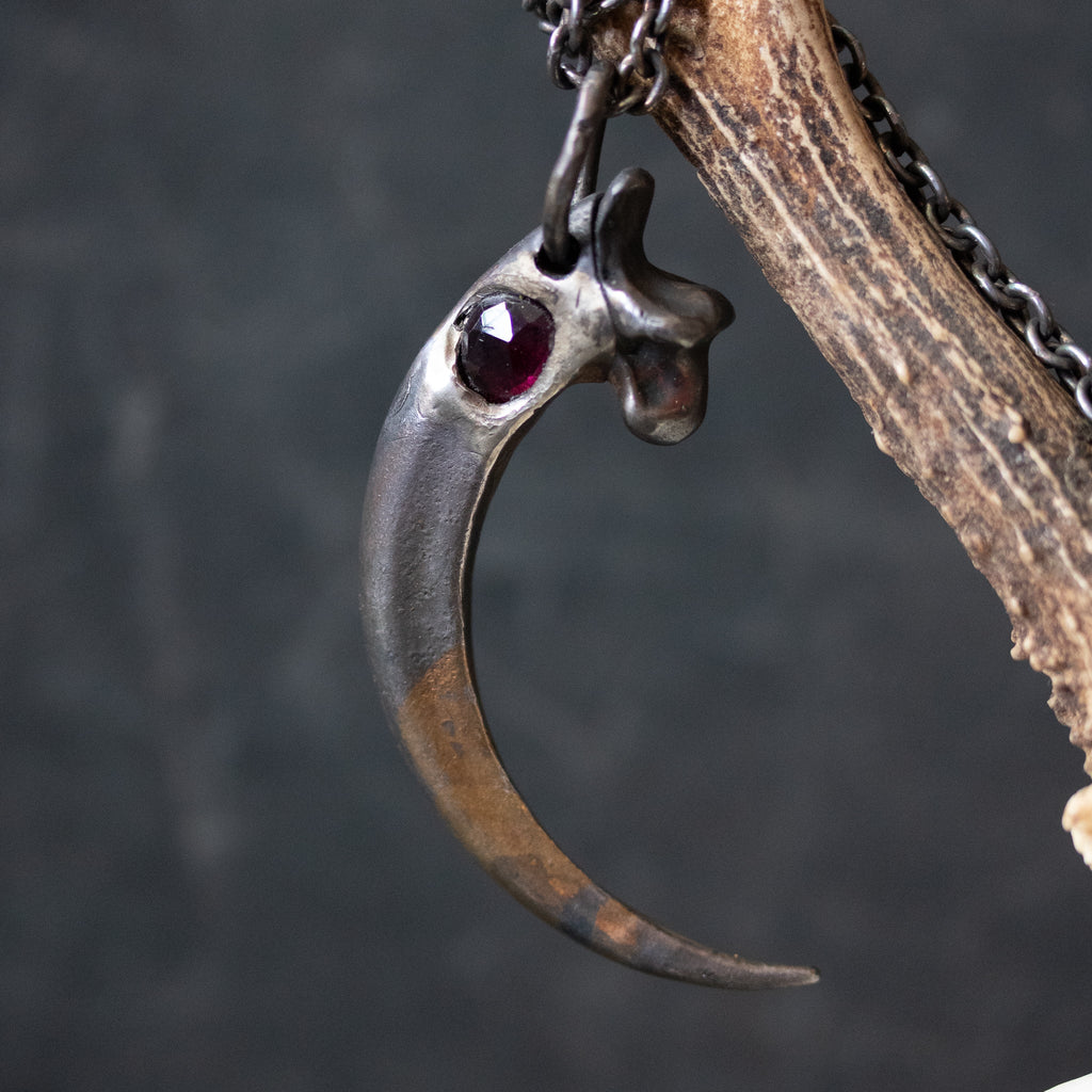 Golden Eagle Talon With Garnet - Machinations