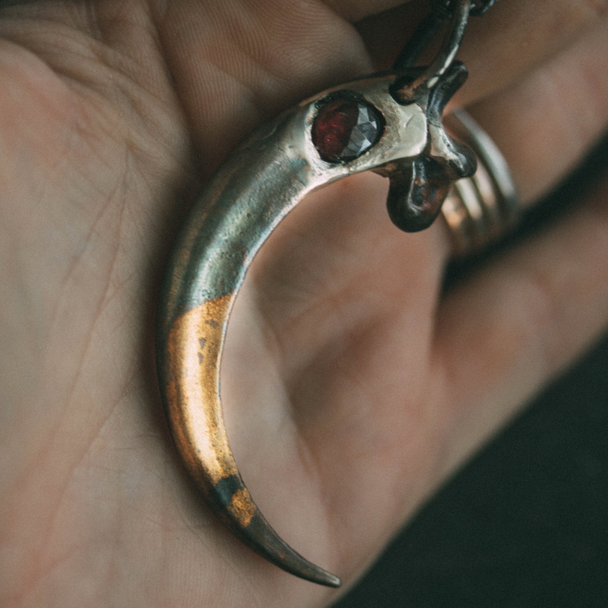 Golden Eagle Talon With Garnet - Machinations