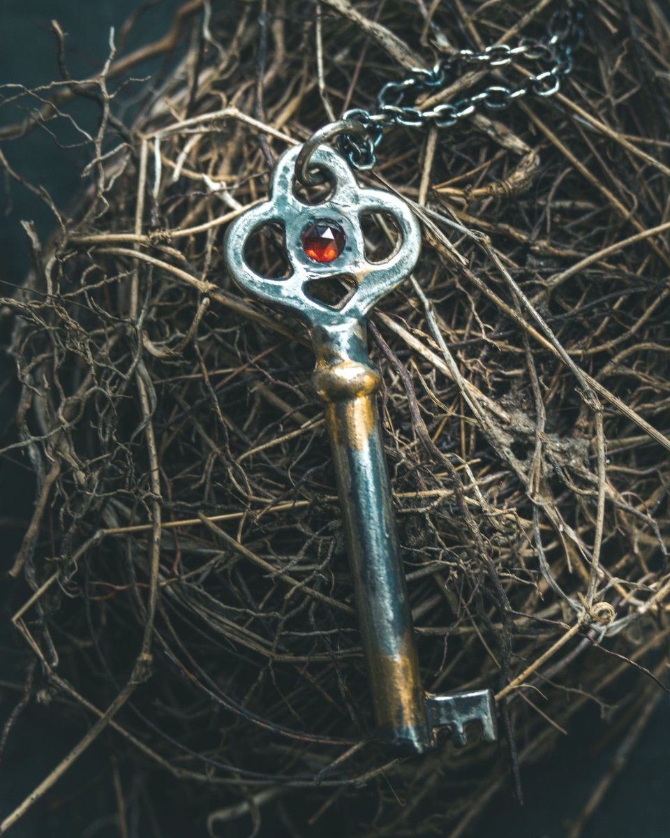 Hekate’s Crossroads Key with Almandine Garnet: A Symbol of Transformation, Passion, and the Power of Choice - Machinations