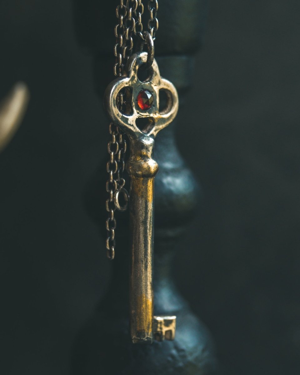 Hekate’s Crossroads Key with Almandine Garnet: A Symbol of Transformation, Passion, and the Power of Choice - Machinations