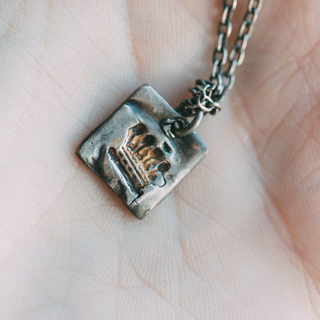 Illuminated Crown Tag Necklace - Machinations