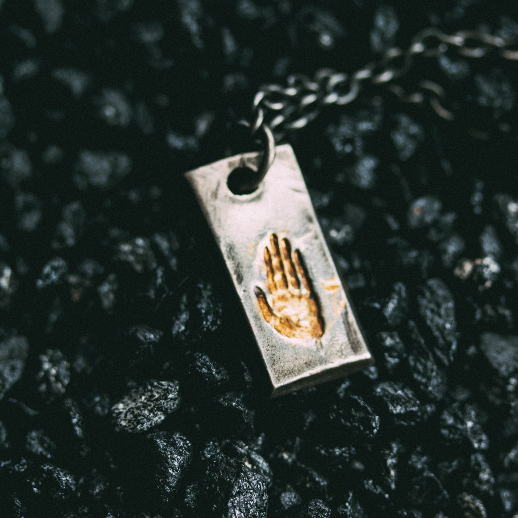 Illuminated Hand Tag Necklace - Machinations