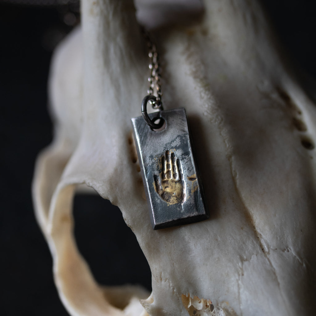 Illuminated Hand Tag Necklace - Machinations