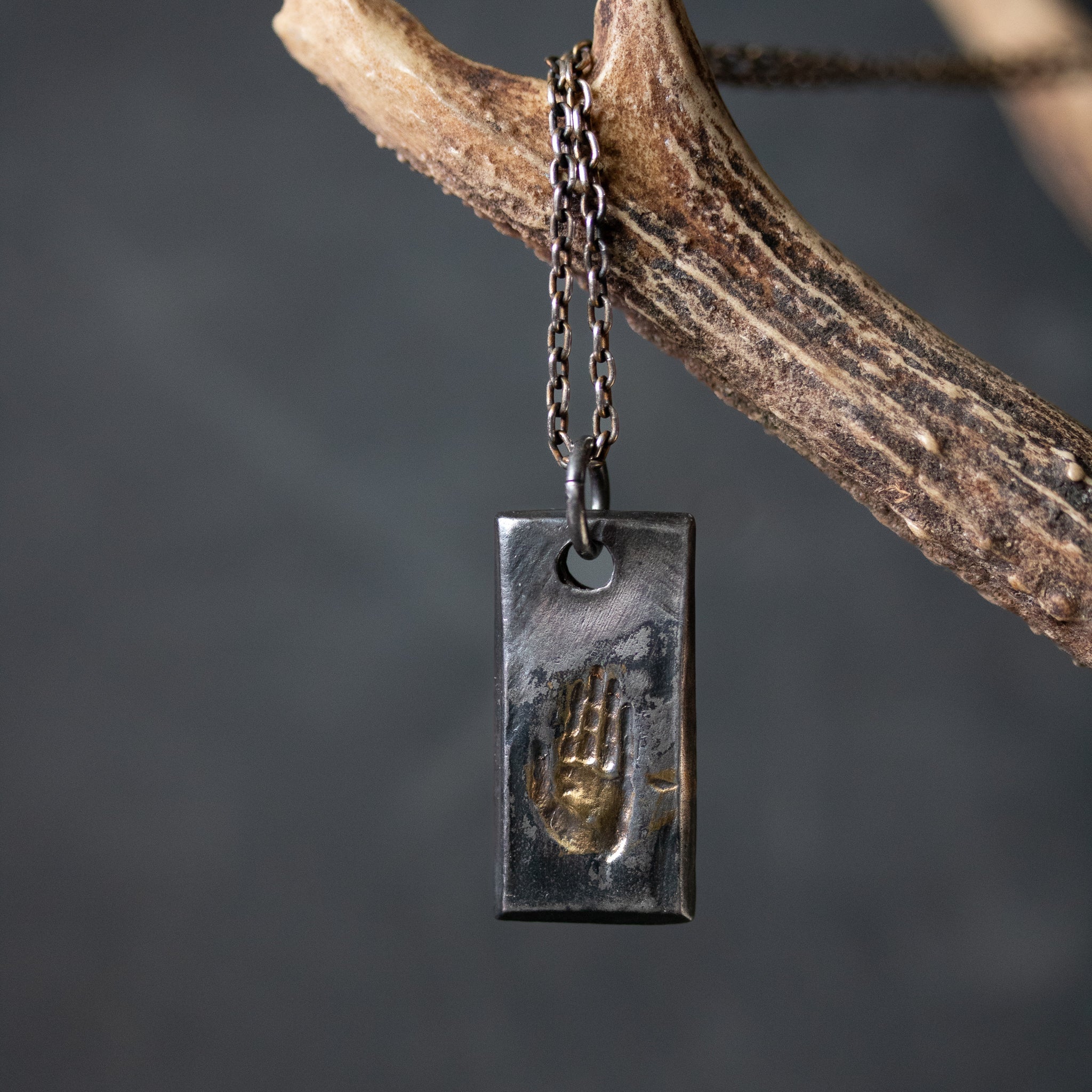 Illuminated Hand Tag Necklace - Machinations