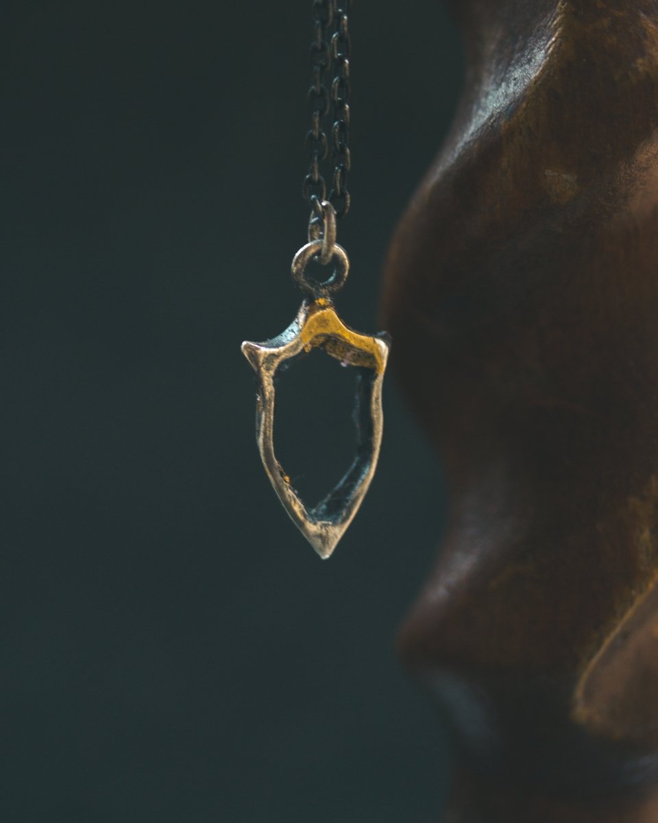 Knights Collection - Hollow Shield Charm | Sterling Silver & 23.5K Gold | Medieval Pilgrimage Token - Machinations