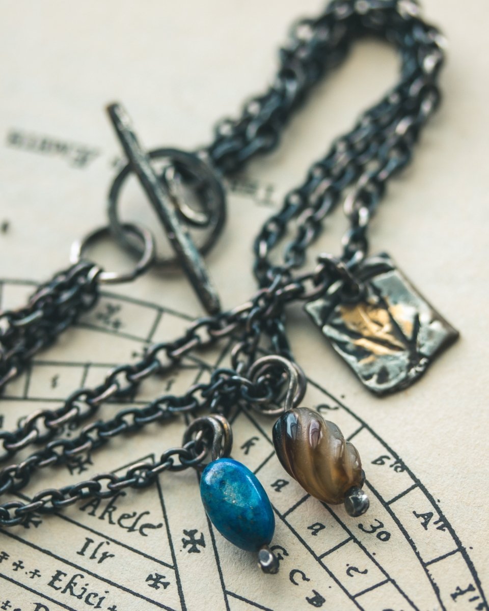 Limited Edition Hand - Forged Charm Bracelet: A Fusion of Elegance and Craftsmanship - Machinations