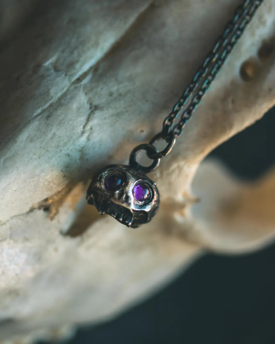 Memento Mori Skull Charm with Amethyst Eyes – Sterling Silver & 23.5K Gold | Talisman of Mortality, Intuition & Inner Strength - Machinations