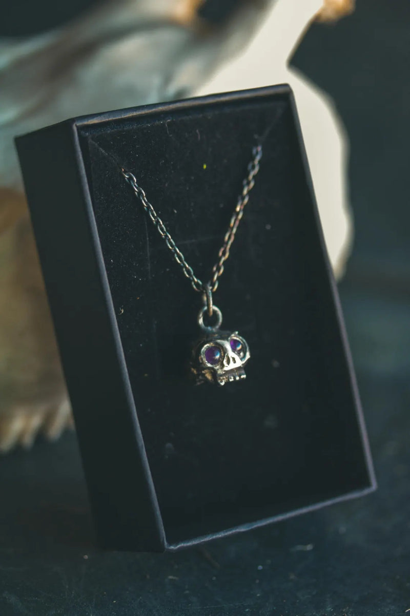Memento Mori Skull Charm with Amethyst Eyes – Sterling Silver & 23.5K Gold | Talisman of Mortality, Intuition & Inner Strength - Machinations