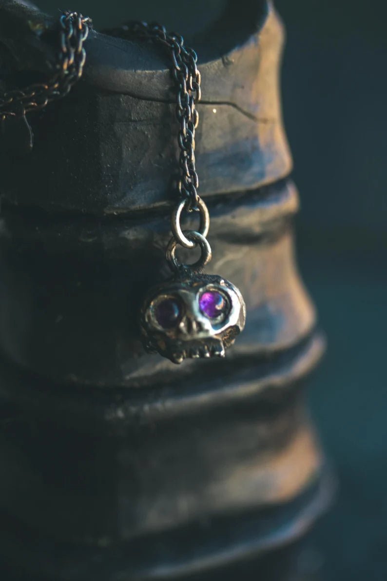 Memento Mori Skull Charm with Amethyst Eyes – Sterling Silver & 23.5K Gold | Talisman of Mortality, Intuition & Inner Strength - Machinations