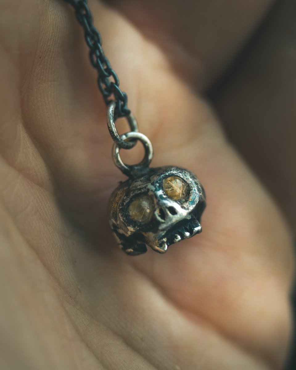 Memento Mori Skull Charm with Cabochon Rutilated Quartz – Sterling Silver & 23.5K Gold | Talisman of Life, Death and Divine Illumination - Machinations