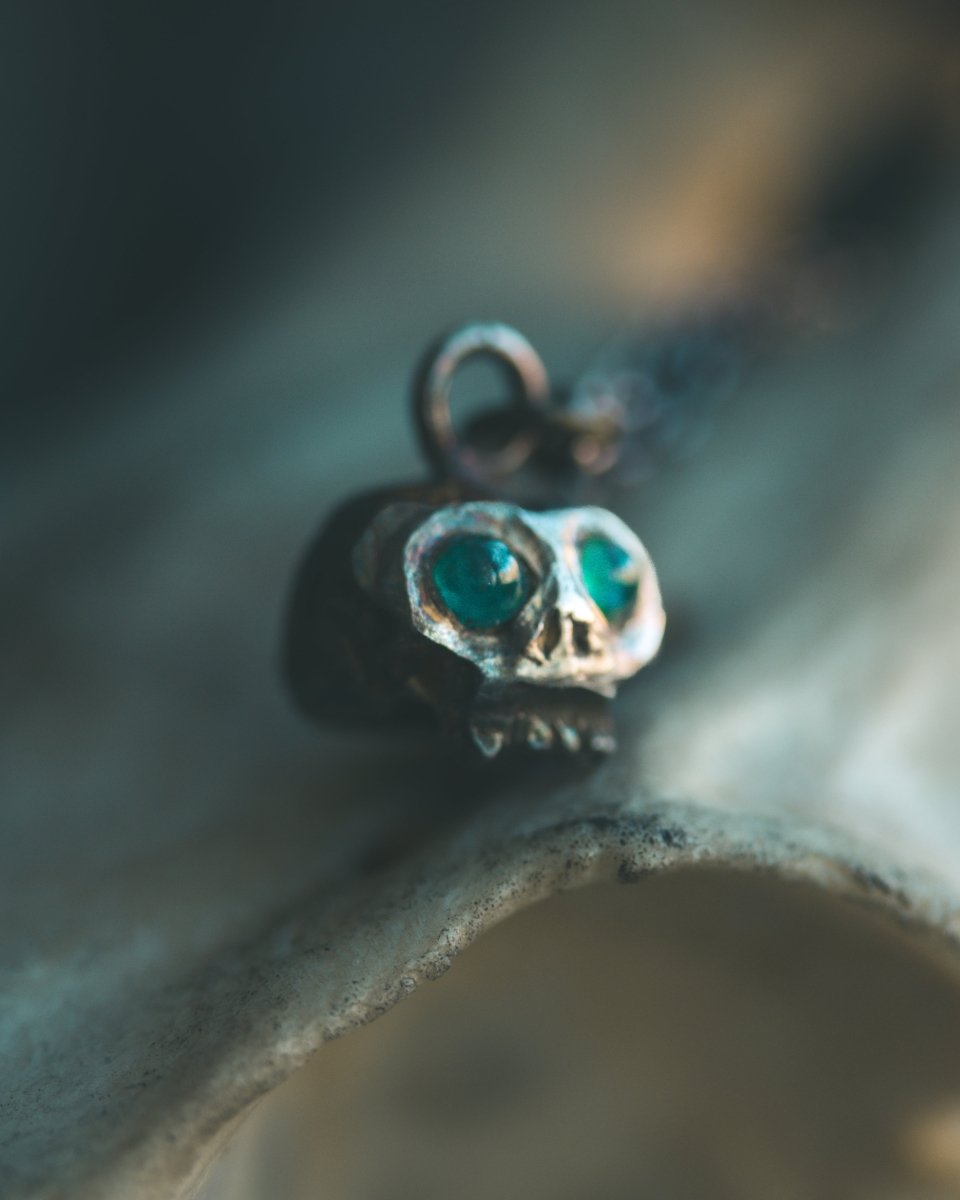Memento Mori Skull Charm with Emerald Eyes – Sterling Silver & 23.5K Gold | Talisman of Life, Death, and Eternal Wisdom - Machinations