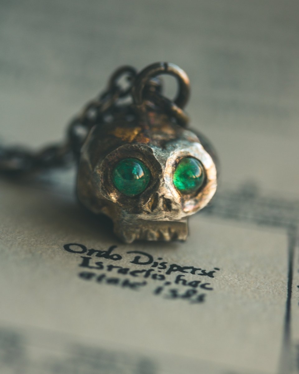 Memento Mori Skull Charm with Emerald Eyes – Sterling Silver & 23.5K Gold | Talisman of Life, Death, and Eternal Wisdom - Machinations