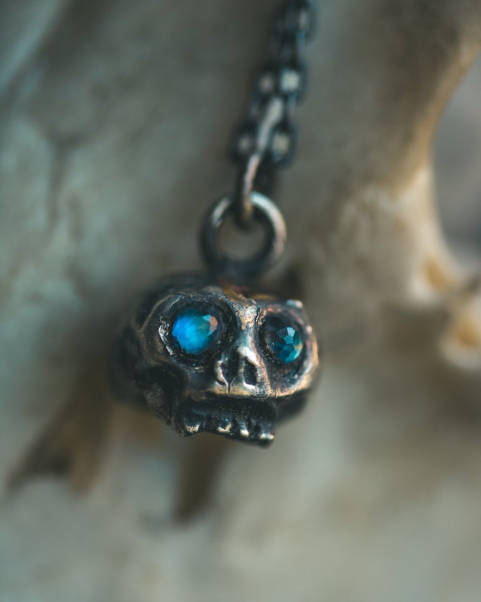 Memento Mori Skull Charm with Rose - Cut Rainbow Moonstone – Sterling Silver & 23.5K Gold | Talisman of Life, Death and Inner Light - Machinations