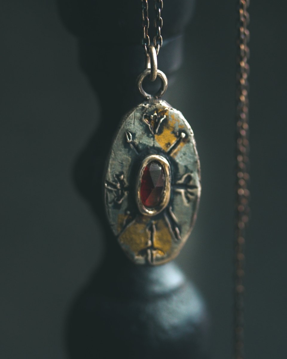 Nordic Talisman Rose - Cut Garnet Amulet: A Gateway to Ancestral Power and Warrior's Fire - Machinations