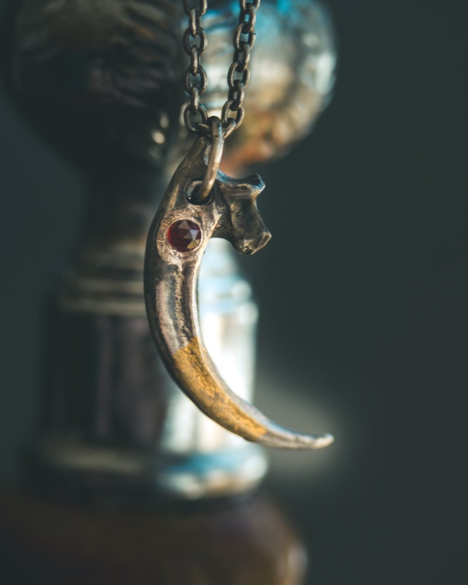 Raven Talon Pendant with Rose - Cut Almandine garnet in Sterling Silver and 23.5K Gold: A Talisman of Prophecy, Protection, and Transformation - Machinations