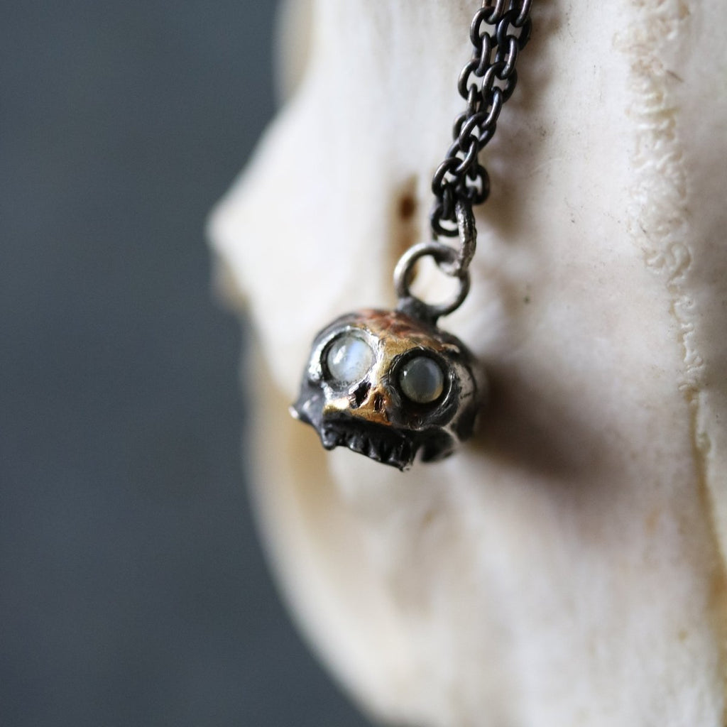 Skull Charm with Chrysoberyl Cat's Eye: Embrace the Duality of Life and Death - Machinations