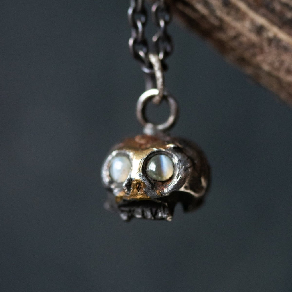 Skull Charm with Chrysoberyl Cat's Eye: Embrace the Duality of Life and Death - Machinations