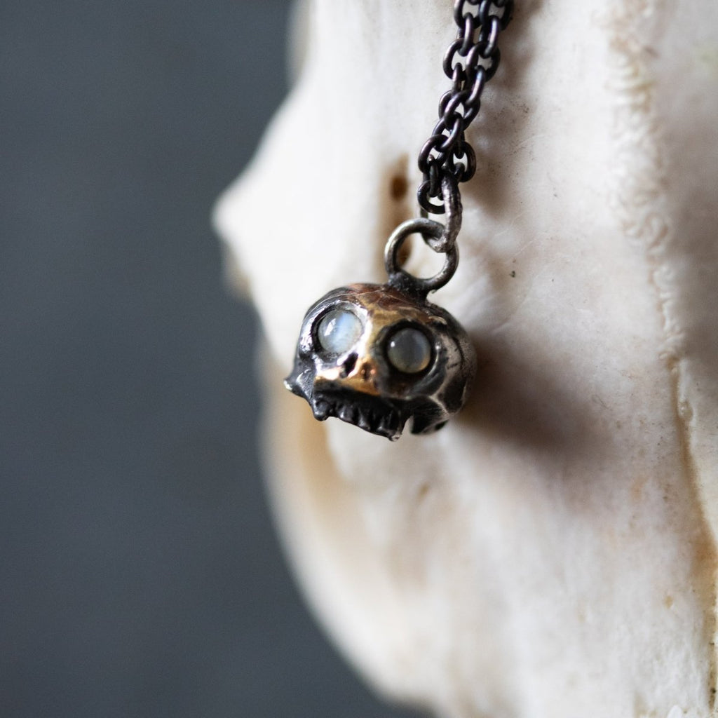 Skull Charm with Chrysoberyl Cat's Eye: Embrace the Duality of Life and Death - Machinations