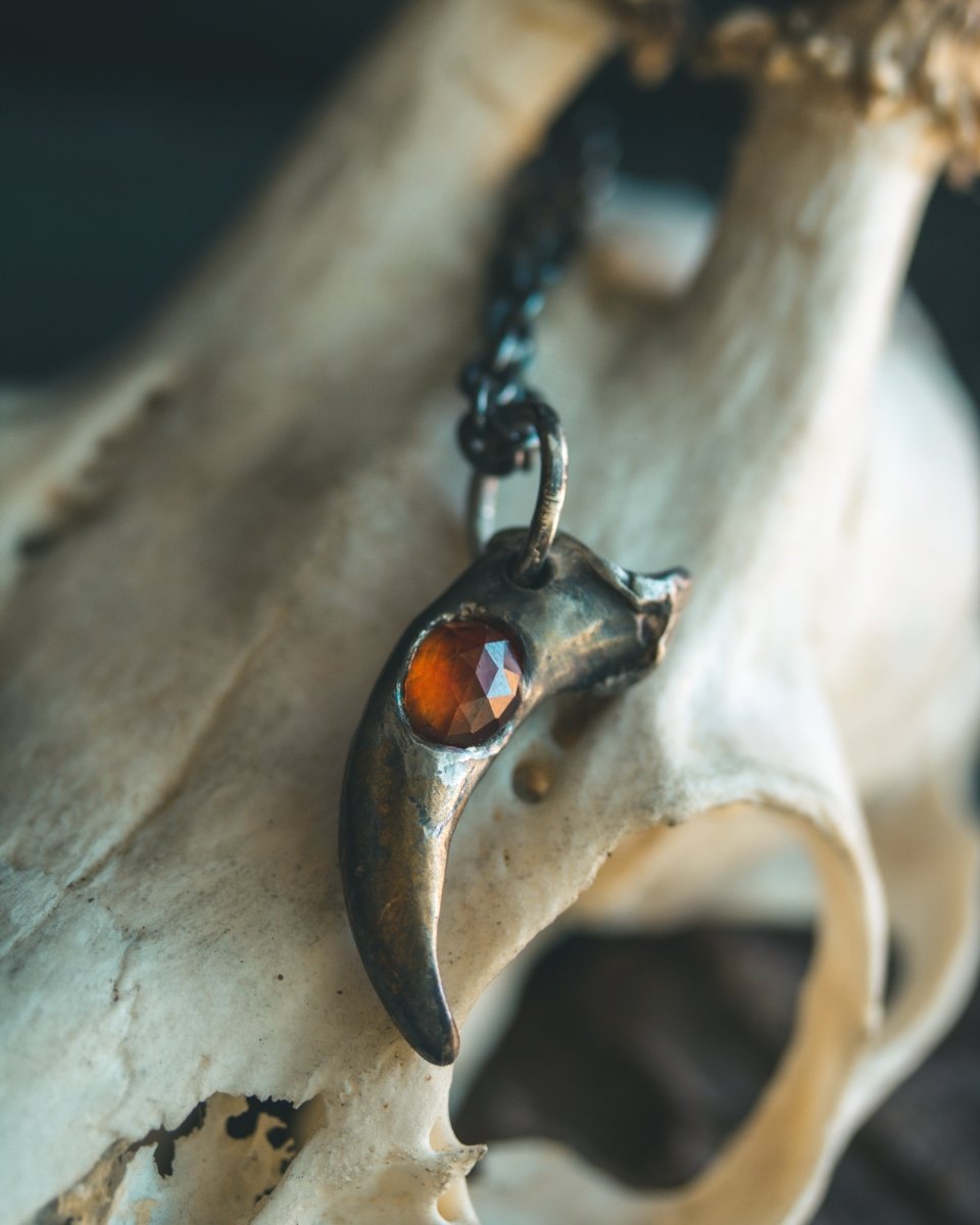 Wolf Claw Pendant with Hessonite Garnet: Symbol of Guardianship and Spiritual Transformation - Machinations