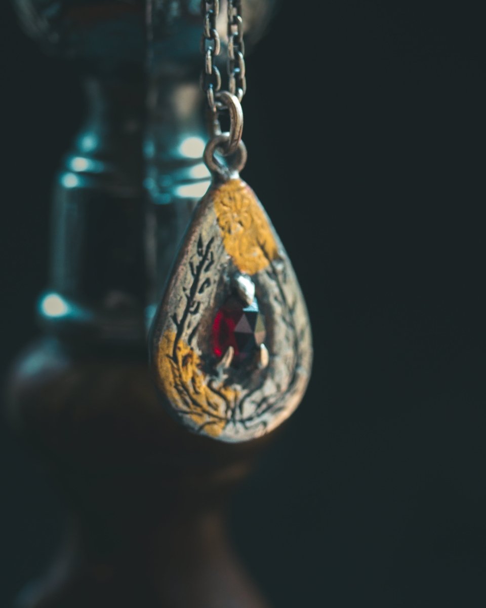 Yaga's Cabinet: Wheat & Flame Talisman - Sterling Silver | 23.5K Keum - boo Gold | Rose - Cut Garnet - Machinations